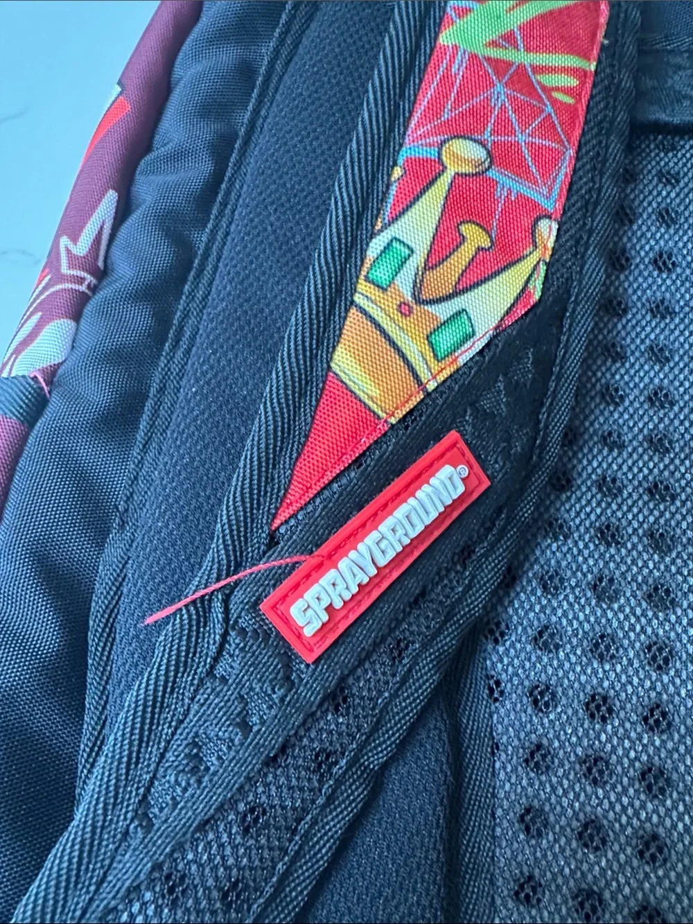 Sprayground Red Kids Backpack with Multicolor Cartoon Graphics